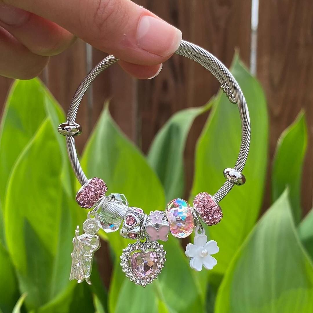 Pulsera de dijes de plata