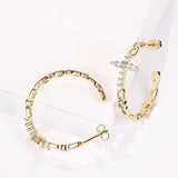 Cross hoop earrings