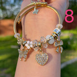 Pulsera de dijes blancos